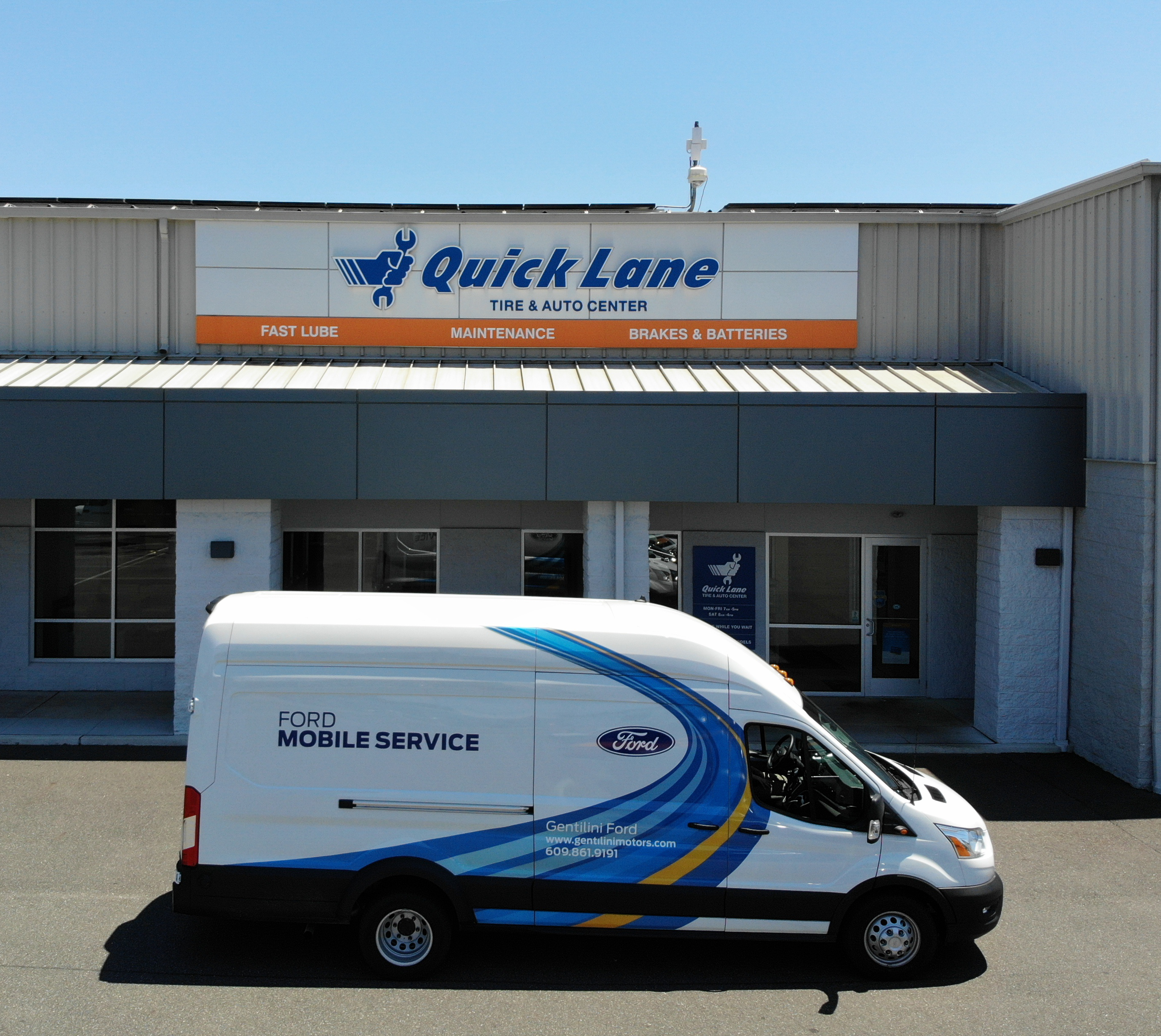 Mobile Service Unit Under Quick Lane Sign Image